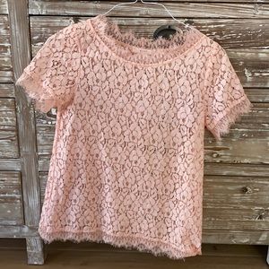 Peach colored floral pattern top